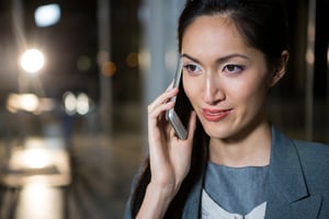 Businesswoman talking on mobile phone in the office