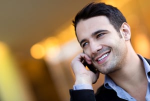 Successful businessman talking on her cell phone